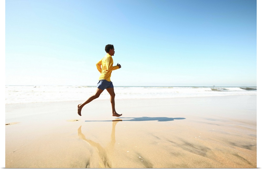 Poster Print Wall Art entitled Man jogging on beach Poster Print Wall Art entitled Man jogging on beach