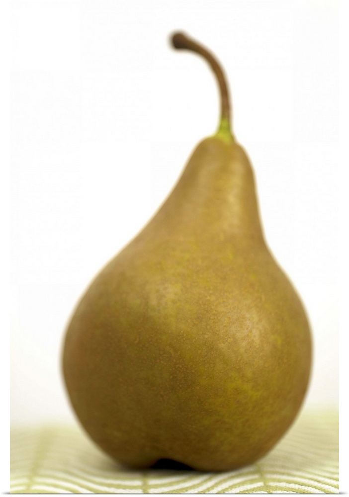 Poster Print Wall Art entitled Pear sitting on a mat Poster Print Wall Art entitled Pear sitting on a mat