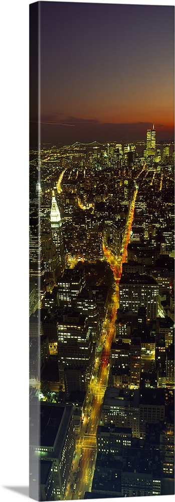 Gallery-Wrapped Canvas entitled Aerial view of a cityscape World Trade Center Lower Manhattan Manhattan New York City New York State.  Aerial view of a cityscape World Trade Center Lower Manhattan Manhattan New York City New York State USA.  Multiple sizes available.  Primary colors within this image include Dark Yellow White Dark Forest Green.  Made in the USA.  Satisfaction guaranteed.  Inks used are latex-based and designed to last.  Canvas frames are built with farmed or reclaimed domestic pine or poplar wood.  Canvas is a 65 polyester 35 cotton base with two acrylic latex primer basecoats and a semi-gloss inkjet receptive topcoat.